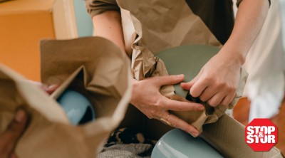 woman cleaning her storage unit stuff