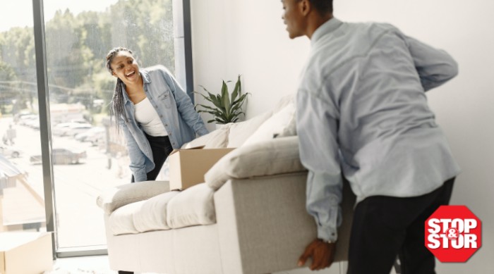 Two Stop & Stor Tenants Moving a Couch